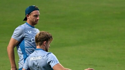 England's Jos Buttler (L) and David Willey attend a practice session. (AFP) England's Jos Buttler (L) and David Willey attend a practice session. (AFP)