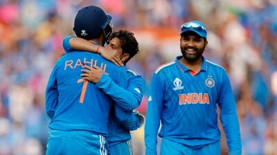 India v Pakistan - India's Kuldeep Yadav celebrates with KL Rahul after taking the wicket of Pakistan's Iftikhar Ahmed as Rohit Sharma looks on (REUTERS)