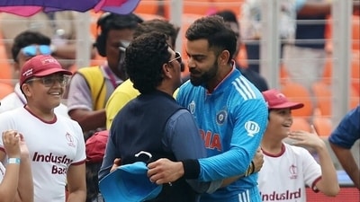 Virat Kohli and Sachin Tendulkar embrace. Virat Kohli and Sachin Tendulkar embrace.