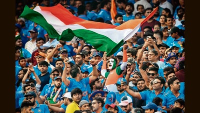 Fans celebrate during the match between India and Pakistan at the Narendra Modi Stadium in Ahmedabad on Saturday. (AFP) Fans celebrate during the match between India and Pakistan at the Narendra Modi Stadium in Ahmedabad on Saturday. (AFP)