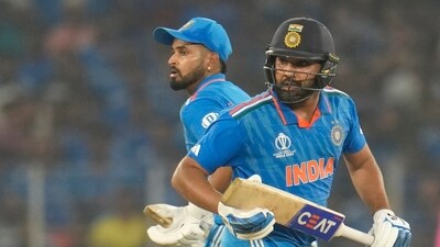 India's captain Rohit Sharma, Shreyas Iyer run between the wickets during the ICC Men's Cricket World Cup match between India and Pakistan in Ahmedabad. (AP)