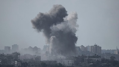 Smoke rises following an Israeli airstrike in the Gaza Strip, as seen from southern Israel, Saturday, Oct. 14, 2023. Israel has been striking targets throughout Gaza since a bloody, cross-border attack by Hamas militants killed over 1,300 Israelis on Oct. 7. (AP Photo/Leo Correa) (AP) Smoke rises following an Israeli airstrike in the Gaza Strip, as seen from southern Israel, Saturday, Oct. 14, 2023. Israel has been striking targets throughout Gaza since a bloody, cross-border attack by Hamas militants killed over 1,300 Israelis on Oct. 7. (AP Photo/Leo Correa) (AP)