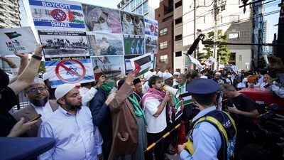 Protesters take part in a pro-Palestinian rally near the Israeli embassy in central Tokyo, Japan. (AFP)