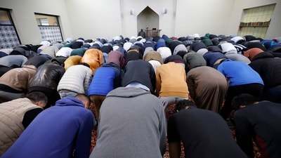 Men pray during Friday prayers, Friday, Oct. 13, 2023, at the Islamic Center of East Lansing in East Lansing, Mich. In Muslim communities across the world, worshippers gathered at mosques for their first Friday prayers since Hamas militants attacked Israel, igniting the ongoing Israel-Hamas war. (AP Photo/Al Goldis) (AP)
