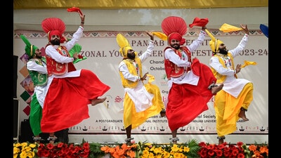 Participants performing bhangra during the Panjab University Zonal Youth & Heritage festival at Guru Gobind Singh College (Ravi Kumar/HT)