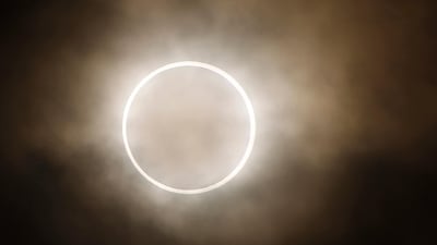 An annular eclipse is viewed from a waterfront park in Yokohama, Japan, near Tokyo, Monday, May 21, 2012. (AP) An annular eclipse is viewed from a waterfront park in Yokohama, Japan, near Tokyo, Monday, May 21, 2012. (AP)
