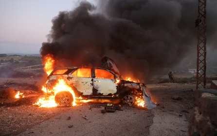 A journalist's car burns at the site where an explosion killed Reuters visual journalist Issam Abdallah and injured colleagues from Reuters and other media, in Alma Al-Shaab near the border with Israel, southern Lebanon. (REUTERS)
