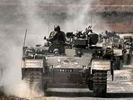 Israeli army Puma armoured personnel carrierss (APCs) move in a column near the Gaza border in southern Israel Israeli army Puma armoured personnel carrierss (APCs) move in a column near the Gaza border in southern Israel