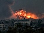 A fireball erupts during Israeli bombardment in the northern Gaza Strip on October 14. A fireball erupts during Israeli bombardment in the northern Gaza Strip on October 14.