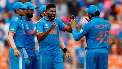 Mohammed Siraj celebrates with Rohit Sharma and teammates after taking the lbw wicket of Pakistan's Abdullah Shafique (REUTERS)