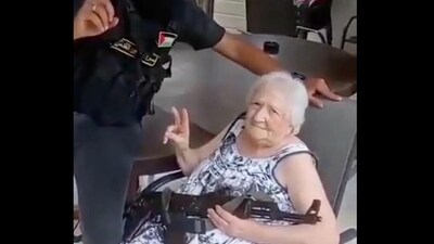 The woman was photographed on her wheelchair during the Hamas attack via (ytirawi/Twitter The woman was photographed on her wheelchair during the Hamas attack via (ytirawi/Twitter
