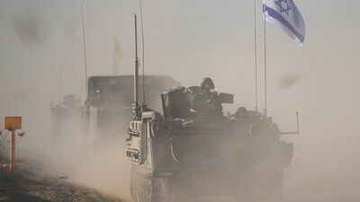 Israel-Hamas War: A convoy of Israeli armoured personnel carriers (APC) head towards the Gaza Strip border in southern Israel. (AP)