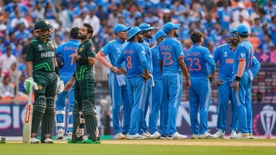 Pakistan's Babar Azam and Mohammad Rizwan wait for the decision of review as Indian players look on during the ICC Men's Cricket World Cup 2023 match between India and Pakistan (PTI) Pakistan's Babar Azam and Mohammad Rizwan wait for the decision of review as Indian players look on during the ICC Men's Cricket World Cup 2023 match between India and Pakistan (PTI)