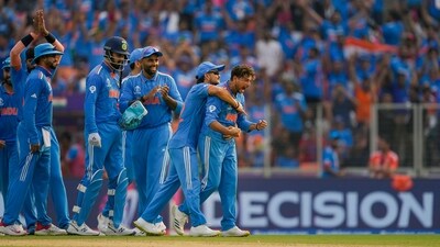 India's Kuldeep Yadav with teammates celebrates the wicket after a successful review for an LBW of Pakistan's Saud Shakeel (PTI) India's Kuldeep Yadav with teammates celebrates the wicket after a successful review for an LBW of Pakistan's Saud Shakeel (PTI)