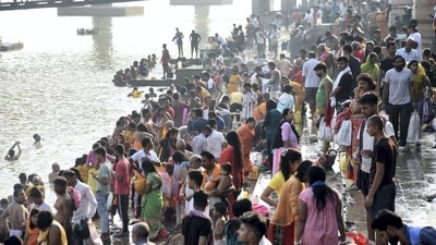Devotees take holy dip in the Ganga river on the first day of the Navratri festival in Patna. (PTI)