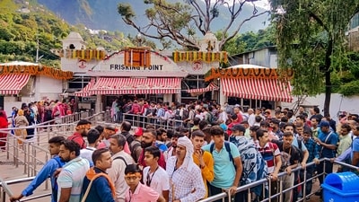 Devotees wait in queues at 'Darshani Deodi' on the way to Mata Vaishno Devi shrine on the first day of the Navratri festival, at Katra in Reasi district. (PTI)
