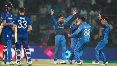 Afghanistan's Rashid Khan with teammates celebrates after winning the ICC Men's Cricket World Cup 2023 Group stage match against England (PTI) Afghanistan's Rashid Khan with teammates celebrates after winning the ICC Men's Cricket World Cup 2023 Group stage match against England (PTI)