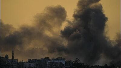 Smoke rises following an Israeli airstrike in the Gaza Strip, as seen from southern Israel, on Sunday. (AP) Smoke rises following an Israeli airstrike in the Gaza Strip, as seen from southern Israel, on Sunday. (AP)