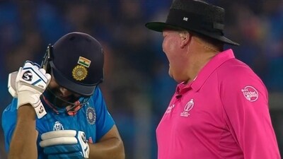 Rohit Sharma (L) sharing a light moment with umpire Marais Erasmus during India's match against Pakistan in 2023 World Cup (Hotstar) Rohit Sharma (L) sharing a light moment with umpire Marais Erasmus during India's match against Pakistan in 2023 World Cup (Hotstar)