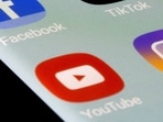 Facebook, TikTok, Twitter, YouTube and Instagram apps are seen on a smartphone in this illustration.