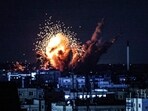 A ball of fire and smoke rise above buildings during an Israeli strike on Rafah in the southern Gaza Strip on October 15. A ball of fire and smoke rise above buildings during an Israeli strike on Rafah in the southern Gaza Strip on October 15.