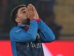 Afghanistan's Rashid Khan reacts after a delivery Afghanistan's Rashid Khan reacts after a delivery