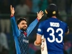 Rashid Khan celebrates at Arun Jaitley Stadium in New Delhi
