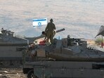 Israeli Merkava tanks are positioned in the north of Israel near the border with Lebanon on October 15. Israeli Merkava tanks are positioned in the north of Israel near the border with Lebanon on October 15.