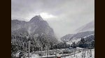 Snow-covered mountains near Atal Tunnel after a fresh spell of snow, in Manali on Monday. (PTI)