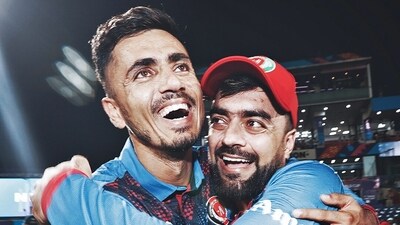 Afghanistan's Mujeeb Ur Rahman and Rashid Khan celebrate the team's victory against England in the ICC Cricket World Cup 2023, at Arun Jaitley Stadium in New Delhi on Sunday (ICC Twitter) Afghanistan's Mujeeb Ur Rahman and Rashid Khan celebrate the team's victory against England in the ICC Cricket World Cup 2023, at Arun Jaitley Stadium in New Delhi on Sunday (ICC Twitter)