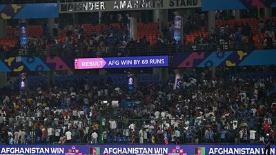 A screen shows Afghanistan's win against England at the end of the 2023 ICC Men's Cricket World Cup one-day international (ODI) match at the Arun Jaitley Stadium in New Delhi on October 15, 2023. (AFP) A screen shows Afghanistan's win against England at the end of the 2023 ICC Men's Cricket World Cup one-day international (ODI) match at the Arun Jaitley Stadium in New Delhi on October 15, 2023. (AFP)