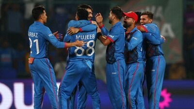Afghanistan players celebrate after the match (REUTERS)