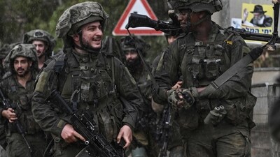 Israel-Hamas War: Israeli army soldiers patrol at an undisclosed position in northern Israel near the borer with Lebanon. (AFP)
