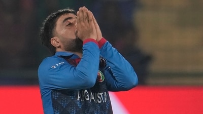 Afghanistan's Rashid Khan reacts after a delivery (AP) Afghanistan's Rashid Khan reacts after a delivery (AP)