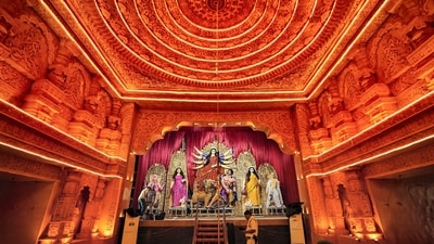Shah also praised the organisers of the 'pandal' (marquee) design, which resembles the Ram temple in Ayodhya, Uttar Pradesh. (PTI) Shah also praised the organisers of the 'pandal' (marquee) design, which resembles the Ram temple in Ayodhya, Uttar Pradesh. (PTI)
