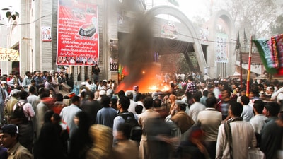 People gathering around the well of fire and celebrating Mela Chiraghan at the shrine of Sufi saint Madho Lal Hussain near Lahore, Pakistan. (Sher Ali Photographer / Shutterstock) People gathering around the well of fire and celebrating Mela Chiraghan at the shrine of Sufi saint Madho Lal Hussain near Lahore, Pakistan. (Sher Ali Photographer / Shutterstock)