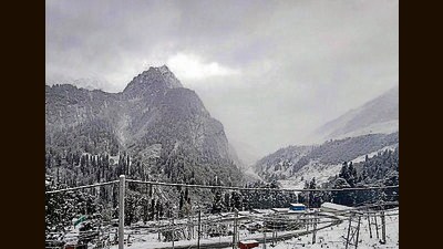 Snow-covered mountains near Atal Tunnel after a fresh spell of snow, in Manali on Monday. (PTI)