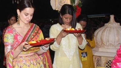 Kangana Ranaut and Rangoli Chandel sought blessings ahead of Tejas' release. Both of them opted for ethic outfits. Rangoli was seen in a yellow and white suit. 