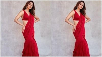 A saree is the perfect outfit for any Indian festival. And if you want to go hot but still maintain your style quotient, don't worry, we've got just the perfect saree inspiration for you. Pooja Hedge's stylish red saree is sure to make you the centre of the Navratri party. It features an intriguing ruffle pattern at the hem and a flowing silhouette. Pair it with a sexy V-neck blouse, add some chunky jewellery, leave your hair loose and you are ready to steal hearts. (Instagram/@hegdepooja) A saree is the perfect outfit for any Indian festival. And if you want to go hot but still maintain your style quotient, don't worry, we've got just the perfect saree inspiration for you. Pooja Hedge's stylish red saree is sure to make you the centre of the Navratri party. It features an intriguing ruffle pattern at the hem and a flowing silhouette. Pair it with a sexy V-neck blouse, add some chunky jewellery, leave your hair loose and you are ready to steal hearts. (Instagram/@hegdepooja)