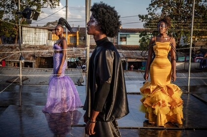 Kibera Fashion Week is a platform created from the community to redefine fashion and creativity while showcasing beauty and talent as a way to change the narrative about Nairobi's largest informal settlement. (Photo by LUIS TATO / AFP) Kibera Fashion Week is a platform created from the community to redefine fashion and creativity while showcasing beauty and talent as a way to change the narrative about Nairobi's largest informal settlement. (Photo by LUIS TATO / AFP)