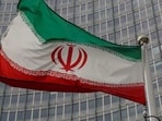 An Iranian flag flutters.