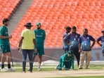 Pakistan's Mohammad Rizwan, centre, Iftikhar Ahmed and Shaheen Afridi check the pitch during a practice session Pakistan's Mohammad Rizwan, centre, Iftikhar Ahmed and Shaheen Afridi check the pitch during a practice session