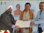 Uttarakhand chief minister Pushkar Singh Dhami is seen during the signing of MoU with an industrial group in Dubai.