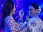 Rekha and Hema Malini danced to Kya Khoob Lagti Ho at the latter's birthday bash. Rekha and Hema Malini danced to Kya Khoob Lagti Ho at the latter's birthday bash.