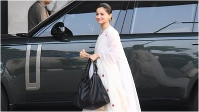 Coming to her ensemble, Alia's suit set features a kurta with a round neckline, quarter-length sleeves, scalloped hems, and an embroidered red floral design. She styled it with matching palazzo pants and a net dupatta, both featuring scalloped borders. (Instagram) Coming to her ensemble, Alia's suit set features a kurta with a round neckline, quarter-length sleeves, scalloped hems, and an embroidered red floral design. She styled it with matching palazzo pants and a net dupatta, both featuring scalloped borders. (Instagram)