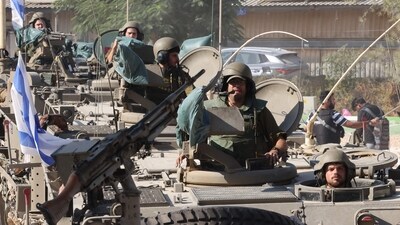 Israel-Hamas War: Israeli soldiers are positioned outside kibbutz Beeri near the border with the Gaza Strip. (AFP) Israel-Hamas War: Israeli soldiers are positioned outside kibbutz Beeri near the border with the Gaza Strip. (AFP)