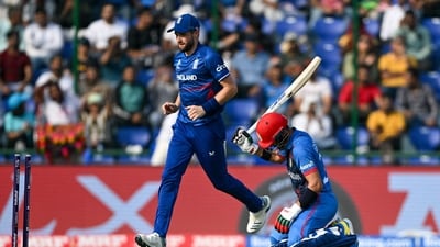 Rahmanullah Gurbaz (R) reacts after his dismissal during the 2023 ICC Men's Cricket World Cup one-day international (ODI) match between England and Afghanistan (AFP) Rahmanullah Gurbaz (R) reacts after his dismissal during the 2023 ICC Men's Cricket World Cup one-day international (ODI) match between England and Afghanistan (AFP)