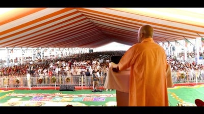 Chief minister Yogi Adityanath addressing the gathering while inaugurating/laying the foundation stone of 256 development projects worth  ₹ 632 crore in Bulandshahr district on Tuesday. (HT)