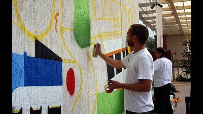 French artists painted murals on the walls of Civil Court Metro Station on Tuesday. (RAHUT RAUT/ HT PHOTO) French artists painted murals on the walls of Civil Court Metro Station on Tuesday. (RAHUT RAUT/ HT PHOTO)