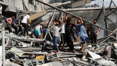 Israel-Hamas War: Palestinians search for casualties at the site of Israeli strikes on houses in Rafah in the southern Gaza Strip. (Reuters)